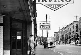 K.C. Irving leaves his office in the Dock Street Building in Saint John, N.B., in the 1920s. - COURTESY OF THE ARTHUR IRVING FAMILY
