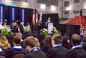The graduates of the Nova Scotia Community College Marconi Campus listen to NSCC president Don Bureau during morning convocation ceremonies. GREG MCNEIL/CAPE BRETON POST