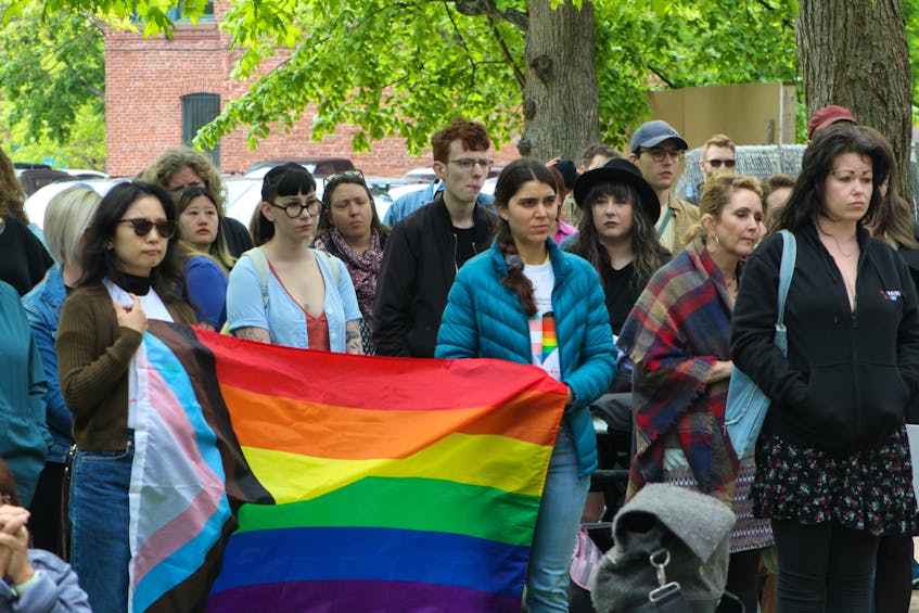 A crowd of more than 200 people gathered in front of the George Coles Building in Charlottetown on June 9 to show support for the P.E.I. trans and LGBTQ+ community. Earlier in the week, flyers distributed around the capital early in the week encouraged parents to take action against guidelines adopted by the P.E.I. government in 2021 designed to protect trans and queer youth in the school system. Rafe Wright • The Guardian