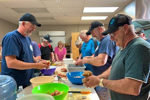 Island Barrington Passage volunteer firefighters cook and clean lobsters in the kitchen at their hall in Centerville, Cape Sable Island  in preparation for their annual Seal Island Breakfast  (scrambled eggs and lobster) on June 10, which they are offering for free this year as a way to say thank you to the community for the support given to firefighters during the Shelburne County wildfire. KATHY JOHNSON
