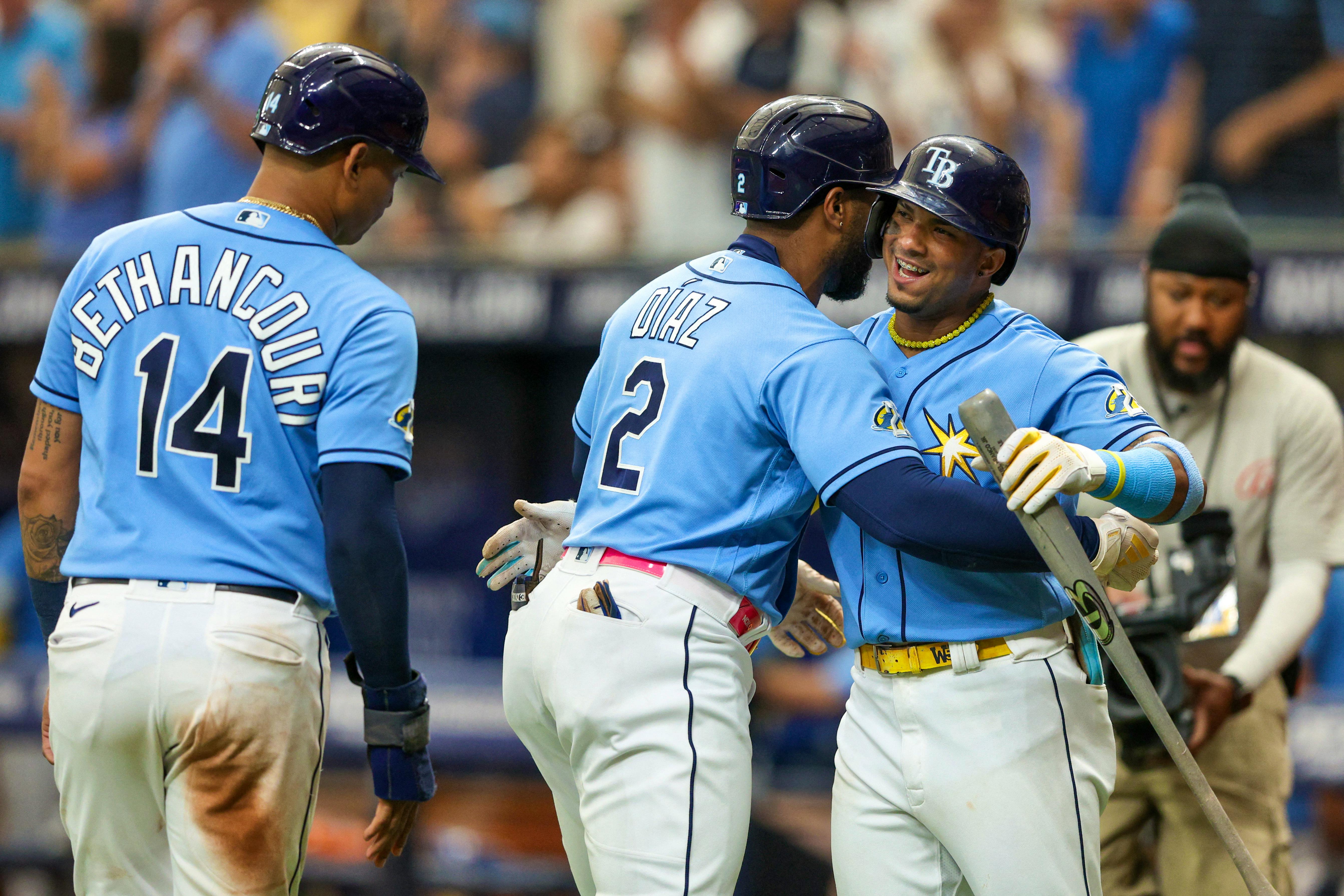 Adolis Garcia bops Texas Rangers to victory over Tampa Bay Rays in 10 -  Lone Star Ball