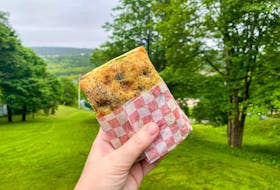 This neatly-packed Coffee Matters Chicken Pesto Sandwich is the perfect grab-and-go option for your next hike. - Gabby Peyton