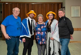 What better way to top off Jason and Bronwyn Harrell’s’ “Come From Away” inspired wedding than to be screeched in by three Gander residents who are the inspirations for characters in the hit musical about the town’s response to 911. From left, are, Oz Fudge, Jason Harrell, Beulah Cooper, Bronwyn Harrell and Brian Mosher. The Harrells came from South Carolina to elope in Gander.
