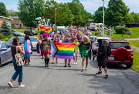 Rouge Fatale leads a community pride march in 2019 - Contributed