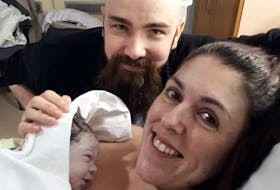 Stefanie Allen at the Health Science Center in St. John’s, N.L. after the birth of her child. Childbirth, she says, was not what she expected based on what she'd seen in the movies. - Contributed