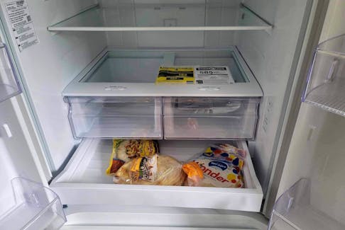 Amber Miller found expired naan bread and tortillas in the deli drawer of what was supposed to be her new fridge from Cohen's Home Furnishings.