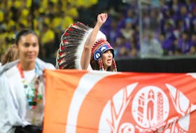 A member of Team Saskatchewan raises their fist during  the opening ceremonies for the North American Indigenous Games in Halifax Sunday July 16, 2023.

TIM KROCHAK PHOTO