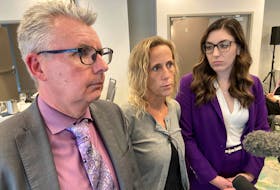 Carrie Low, flanked by her lawyers, Jason Cooke and Cydney Kane, voices disappointment with the Nova Scotia Police Review Board hearing into her complaint against the Halifax Regional Police on Thursday, July 20, 2023, in Dartmouth. - Francis Campbell