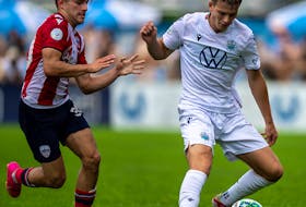 HFX Wanderers' Daniel Nimick, right, plays the ball away from Atletico Ottawa's Gabriel Antinoro during Canadian Premier League action on Sunday at the Wanderers Grounds. - James Bennett/Halifax Wanderers