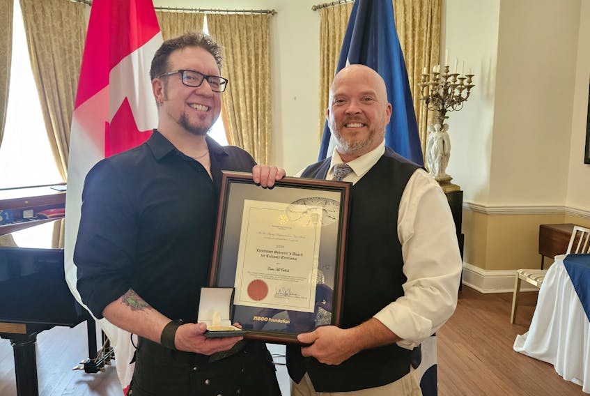 Sydney resident Colin McCulloch, left, was among five Nova Scotia Community College students from across Nova Scotia to receive this year’s Lieutenant-Governor’s Award for Culinary Excellence. The award was presented recently during a ceremony at Government House in Halifax. Also attending was Chef Adam White, right, a culinary program instructor at NSCC Marconi Campus. CONTRIBUTED PHOTO