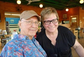 Thelma Porier became friends with the late actor Alan Arkin after serving him at the Seafood Stop in Chéticamp. CONTRIBUTED