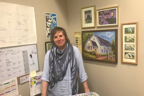 Artistic director Johanna Nutter stands at her desk in the administrative office of Victoria Playhouse. She’s reprising her role as Shirley Valentine in the show of the same name at the theatre this summer. SALLY COLE • Special to the Guardian