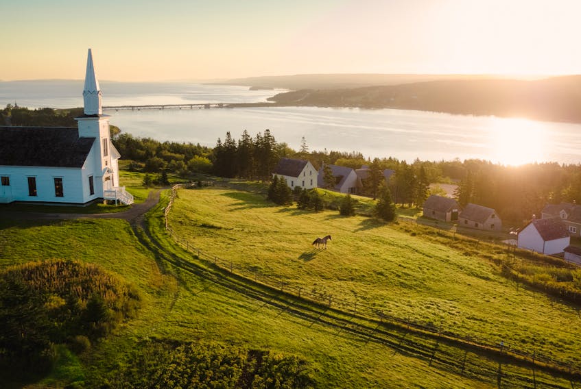 The Baile nan Gàidheal | Highland Village overlooking the Barra Strait – Bras d’Or Lake in Cape Breton. PHOTO CREDIT: Highland Village Museum