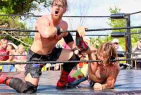 (Moondog) Dylan Davis mocks the crowd as he tortures hometown favourite (Lil’ Blay) Cody Brown during round robin wrestling action in Windsor July 1.