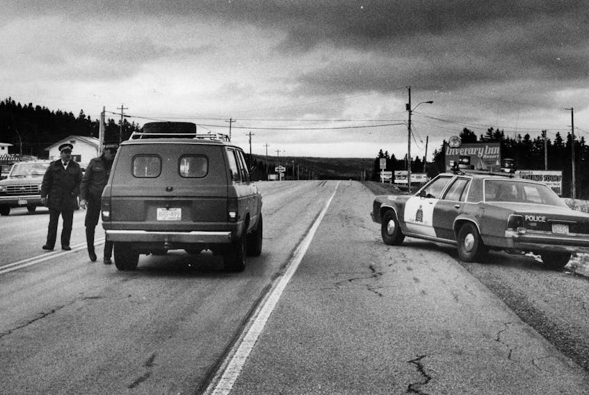 A police checkpoint along the Trans Canada Highway in Boularderie Island before the Seal Island Bridge. Investigators worked around the clock to find the assailants in the armed robbery of the McDonald's restaurant in Sydney River on May 7, 1992.