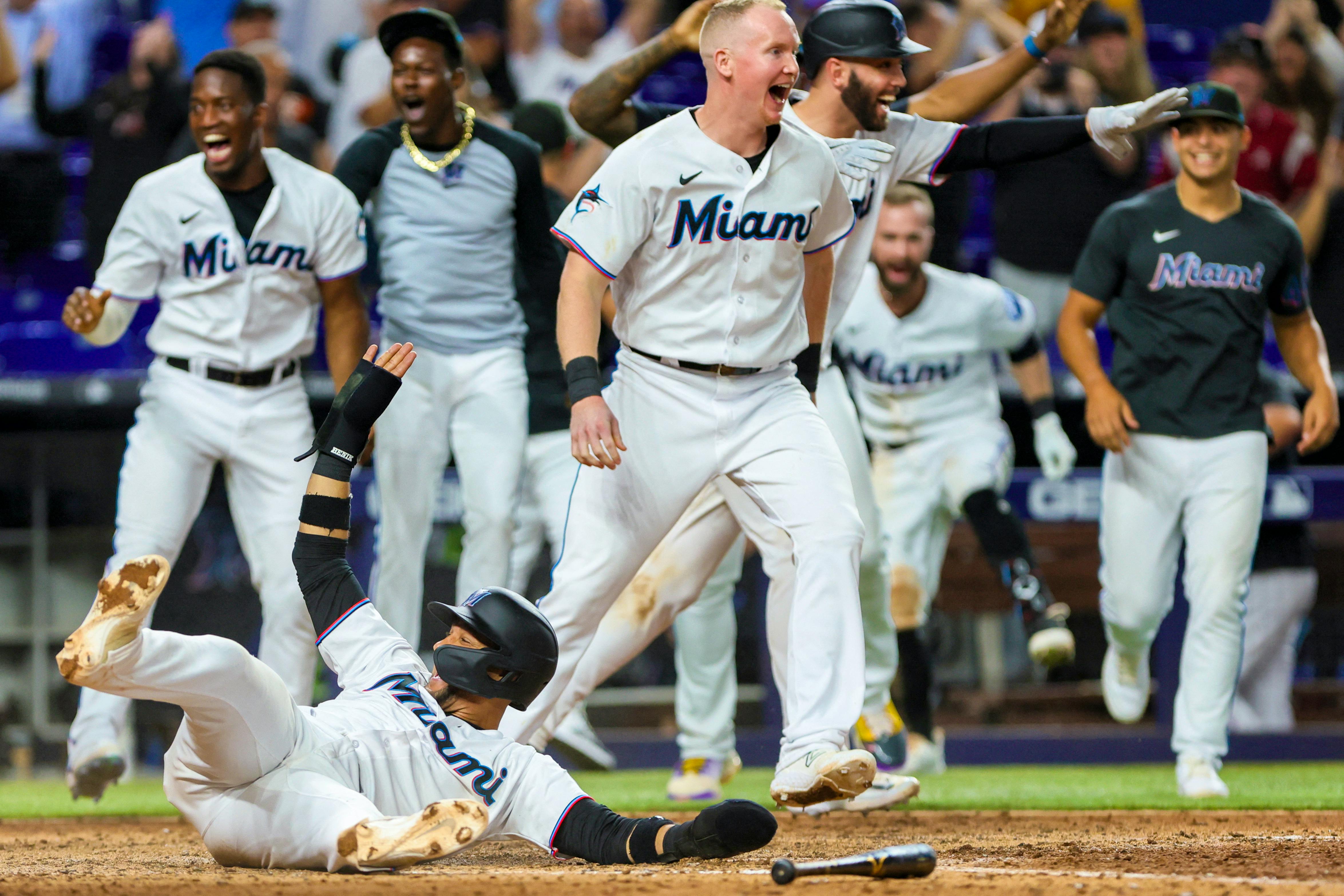 Brewers beat Rockies 7-6 in 10 innings as Mark Canha scores