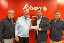Gerry Pettipas, Ship Hector Society, left, stands with John Oliver and Dave Sobey, Campaign Co-chairs, with the $1 million cheque for the Ship Hector Society, and Ralph Heighton, Ship Hector Society. Contributed