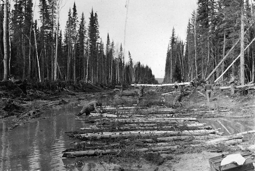  The 341st Engineer Regiment at work on the Alaska Highway around 1942. Photo courtesy Office of History, U.S. Army Corps of Engineers