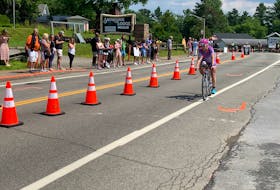 Corena Hughes competes in the cycling event of the Lake Placid Ironman event in New York on July 23. Hughes, from Stratford, P.E.I., qualified for the Ironman women’s world championships in Kona, Hawaii, in September. Contributed