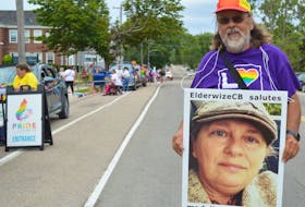 The 2023 Cape Breton pride parade posthumously honoured madeline yakimchuk, who died in June. Getting ready to lead the parade with the ElderwizeCB group, of which yakimchuk was a founder, is their brother Dan. BARB SWEET/THE CAPE BRETON POST