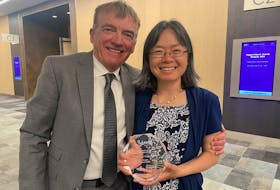 Bill Buckland, left, and Helen Xia attended the Support 4 Sport Awards in Halifax in May where they accepted the Community Sport Organization of the Year award from Tennis Nova Scotia on behalf of Cromarty Tennis Club in Sydney. Both Buckland and Xia are members of the club. CONTRIBUTED/CROMARTY TENNIS CLUB