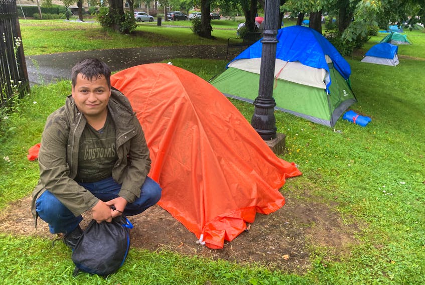 Oscar Mansilla says he's spent more than a week camping out in Victoria Park's homeless encampment. He says he's enjoyed every minute of it.