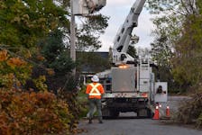 A New Brunswick power truck helps with the restoration efforts in Pictou County.