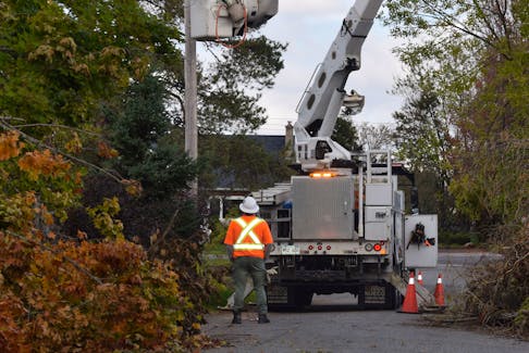 A New Brunswick power truck helps with the restoration efforts in Pictou County.