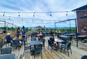 The patio at Shenanigans in C.B.S. has impressive views of the bay, along with a long list of poutines and pizza to pair with it. - GABBY PEYTON