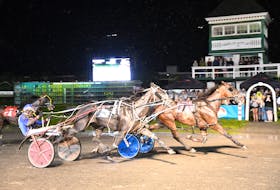 The Jody Jamieson-driven Livinthebeachlife hits the wire first in the SaltWire $30,000 James (Roach) MacGregor Gold Cup and Saucer consolation at Red Shores Racetrack and Casino at the Charlottetown Driving Park on Aug. 18. Time of the mile was 1:53.4. Gail MacDonald Photo • Special to The Guardian