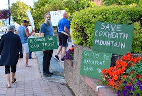 A protest over CBRM council voting on a proposed land sale to copper mine firm Nova Copper prompted a protest outside city hall Tuesday in Sydney. IAN NATHANSON/CAPE BRETON POST