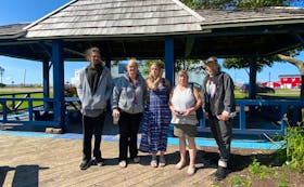 Todd Jay, left, Heather Frizzell, Elysha Whitlock, Ivy Inkpen and Ben Jelley stand in front of a gazebo in downtown Summerside. The gazebo, which a number of the city's homeless residents had been sleeping in, was cleaned up by Summerside staff on Aug. 22. – Kristin Gardiner/SaltWire