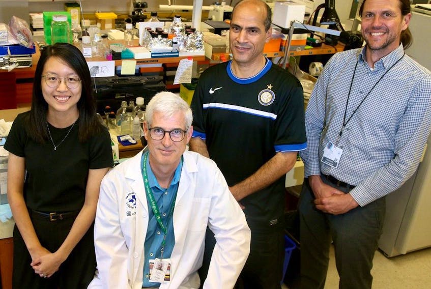  Dr. Guy Trudel, front, with, left to right, research coordinator Tammy Liu, research assistant Mohamed Thabet and MRI physicist Dr. Gerd Melkus.