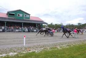 A Better Man, #3 and driver Adam Lynk, won the Saturday afternoon feature at Northside Downs in 1:58.4, over Accelerator and Elm Grove Quiggly, #7. CONTRIBUTED/CHRIS ABBASS