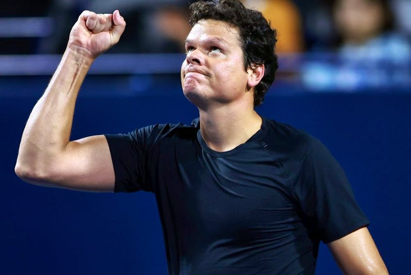 Milos Raonic of Canada celebrates after beating Frances Tiafoe of the United States at the National Bank Open at Sobeys Stadium on August 7, 2023.
