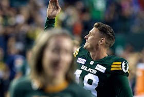 Edmonton Elks place kicker Dean Faithfull (18) gives a queen wave to the fans after kicking the game-winning field goal against the Calgary Stampeders at Commonwealth Stadium in Edmonton on Saturday, Sept. 9, 2023. The Elks won 25-22.