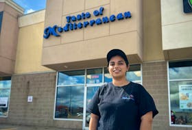 Jasmine Kaur stands in front of the new Taste of Mediterranean restaurant in Charlottetown. She and her husband opened the food establishment on Sept. 1. Thinh Nguyen • The Guardian