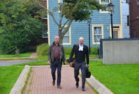John (Jan) Vanderzwaag, 44, left, and his lawyer Brian Ross, enter P.E.I. Supreme Court in Charlottetown on Sept. 12, 2023. Vanderzwaag is standing trial on two counts of sexual assault and one count of sexual interference that allegedly involved two male complainants in 2001. The trial is being heard by a 12-person jury and Justice John Mitchell. Terrence McEahern • The Guardian