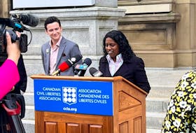 Harini Sivalingam, the Canadian Civil Liberties Association's director of equality, speaks to reporters outside of the New Brunswick legislature in Fredericton, announcing a legal challenge to Policy 713. - Canadian Civil Liberties Association Facebook photo
