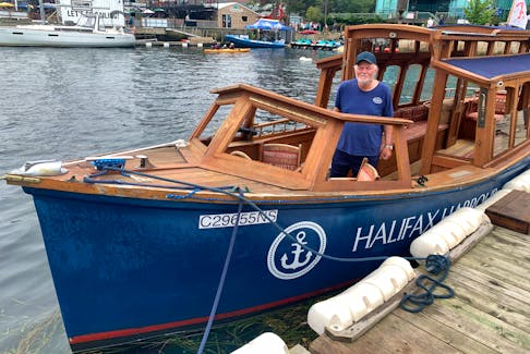 Colin Smith, owner of Halifax Harbour Tours, on board his electric boat on Wednesday. - Bill Spurr