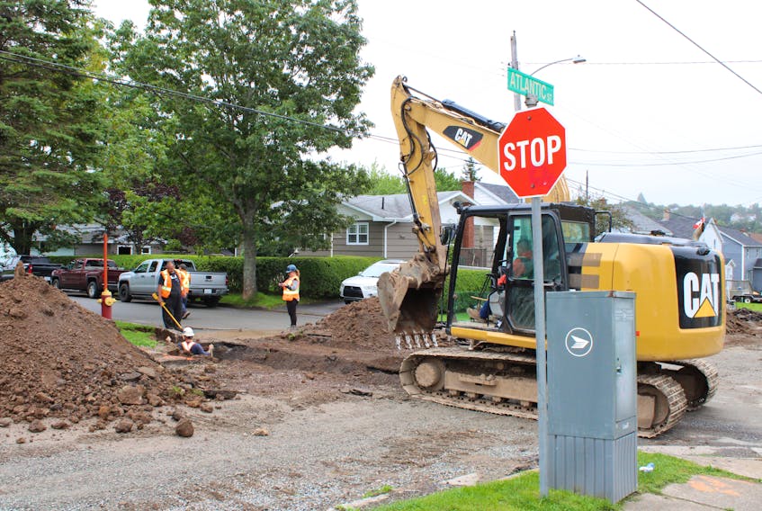 Brilun Construction workers are performing road and water upgrades on the corner of Atlantic and Garden streets in Sydney’s Ashby neighbourhood. Half the length of Atlantic Street and the water system below will receive upgrades from Hospital Street to Terrace Street. MITCHELL FERGUSON/CAPE BRETON POST