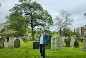 Storyteller Dusty Keleher in Halifax's Holy Cross Cemetery where his lineage and a few characters rest. - Katy Jean