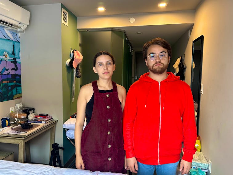Jennifer Matamala and her boyfriend, Cesar Peña, are forced to stay in a hotel room after the newcomer couple, originally from Chile, discovered that their new Charlottetown apartment was infested with cockroaches. Thinh Nguyen • The Guardian
