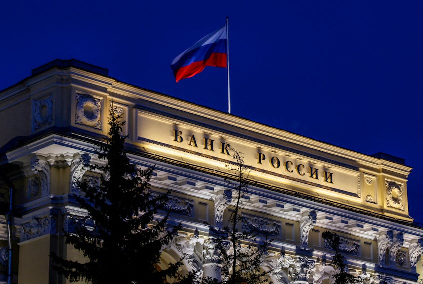 MOSCOW (Reuters) - Russia's central bank raised its key interest rate by 100 basis points to 13% on Friday, jacking up the cost of borrowing for the third meeting in succession in response to a weak