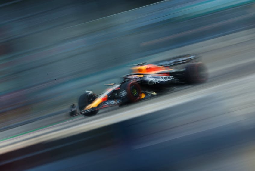 SINGAPORE (Reuters) - Red Bull's double Formula One world champion Max Verstappen was handed two reprimands in the space of one qualifying session but escaped a grid drop at the Singapore Grand Prix