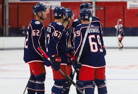 Halifax Mooseheads winger Jordan Dumais celebrates with teammates after a Columbus Blue Jackets goal in NHL rookie tournament play in Traverse City, Michigan on Saturday. - Columbus Blue Jackets