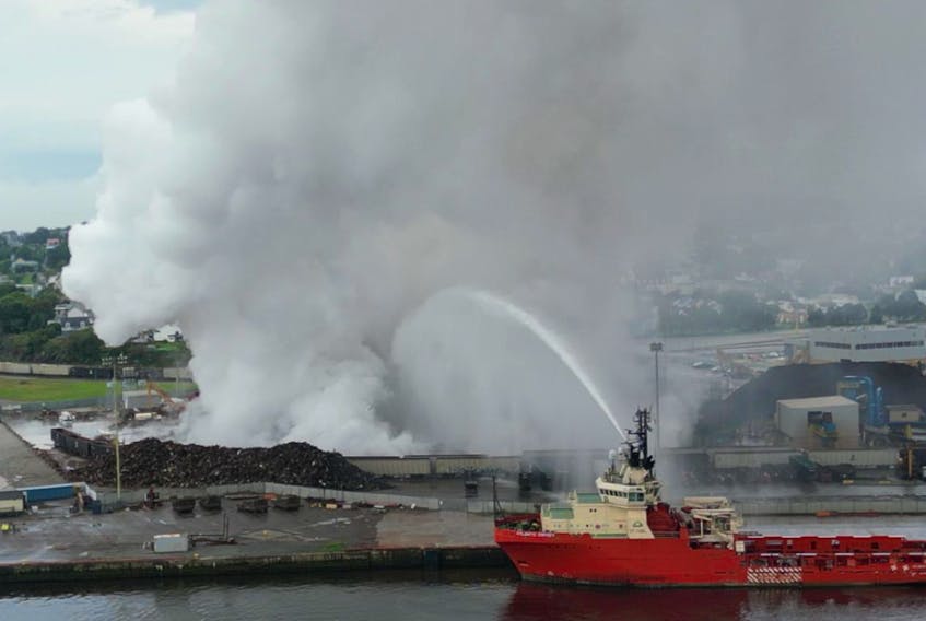 The Atlantic Osprey was one of several offshore support vessels to assist in dousing a stubborn fire at AIM Recycling in the Port of Saint John on Thursday, Sept. 14, 2023. (Photo by J.D. Irving via Facebook)