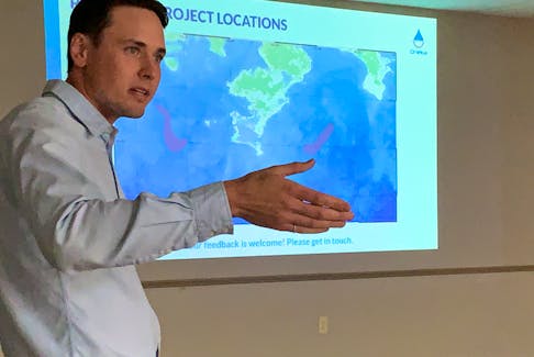Daniel O’Brien, project manager for Oneka Technologies, talks about the company’s pilot project during an information session at the Island Barrington Passage Fire Hall on Sept. 13. The two purple sites on the map of the power point presentation shows two potential sites where the company’s desalination buoy may be deployed in waters off Cape Sable Island. KATHY JOHNSON