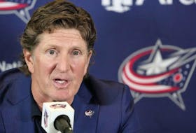 Mike Babcock addresses the media as the Columbus Blue Jackets introduce Babcock as their new head coach during a news conference on July 1, 2023, in Columbus, Ohio. The NHL Players' Association says its executive director and assistant executive director are in Columbus, Ohio, to investigate reports of Babcock invading players' privacy.