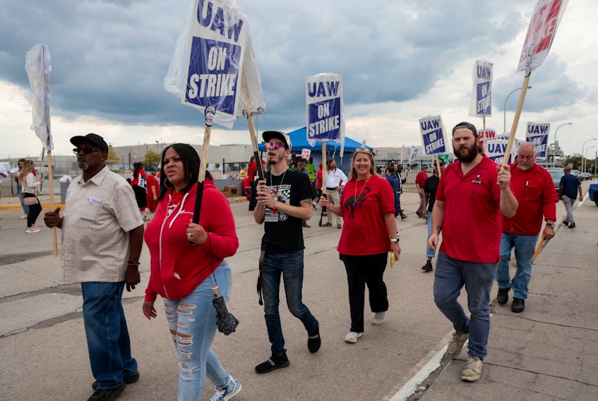 (Reuters) - The United Auto Workers strike against the Detroit Three automakers enters its fourth day on Monday as both sides try to hammer out deals to avoid costly disruptions to more plants. Union